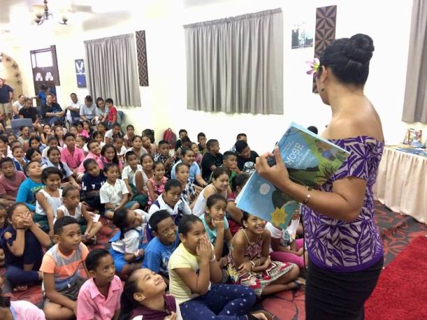 Samoa 21-001 Miss Samoa 2018 reading to school children, Credit - Jane Vaafanga